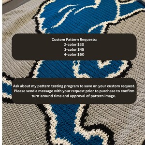 May include: A crocheted blanket featuring a blue and white design on a gray background. The blanket has a custom pattern request with options for 2, 3, and 4 colors. The text on the image says to ask about the pattern testing program.