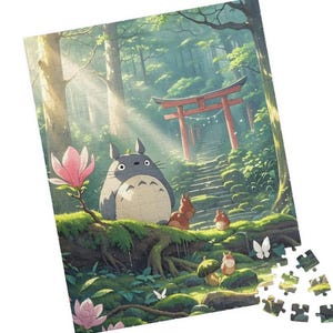 May include: A jigsaw puzzle featuring a scene from a forest with a large, gray, cartoon-like character, a red torii gate, and a staircase. The puzzle has a partially assembled image with loose pieces scattered on the side. The scene includes pink flowers, butterflies, and small brown creatures.