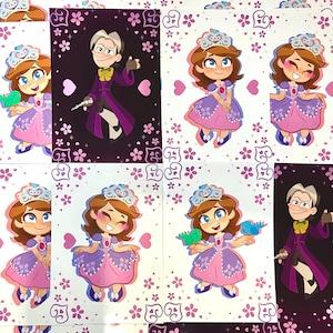 May include: A selection of art prints showcasing cartoon illustrations of a princess in a pink and purple dress, a tiara, and a bird. Some prints also feature a man in a purple coat.