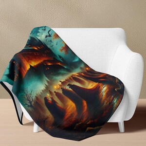 May include: A black and teal fleece throw blanket with a spooky Halloween scene featuring a dark, mysterious house, trees, and figures in the distance. The scene is set against a backdrop of a dark, stormy sky with bats flying overhead.