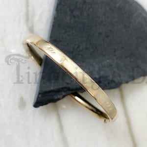 A Sweet Vintage H.F. Barrows 14k Gold Baby Bangle, Hinged with Fancy Engraved Heart Design on the Top Half, Circa 1950&#39;s-1960&#39;s.