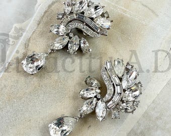 Vintage Crown Trifari Earrings, Silver Tone Clip Backs with Marquise, Round, Baguette and Pear Shaped Rhinestones, Circa 1980's.