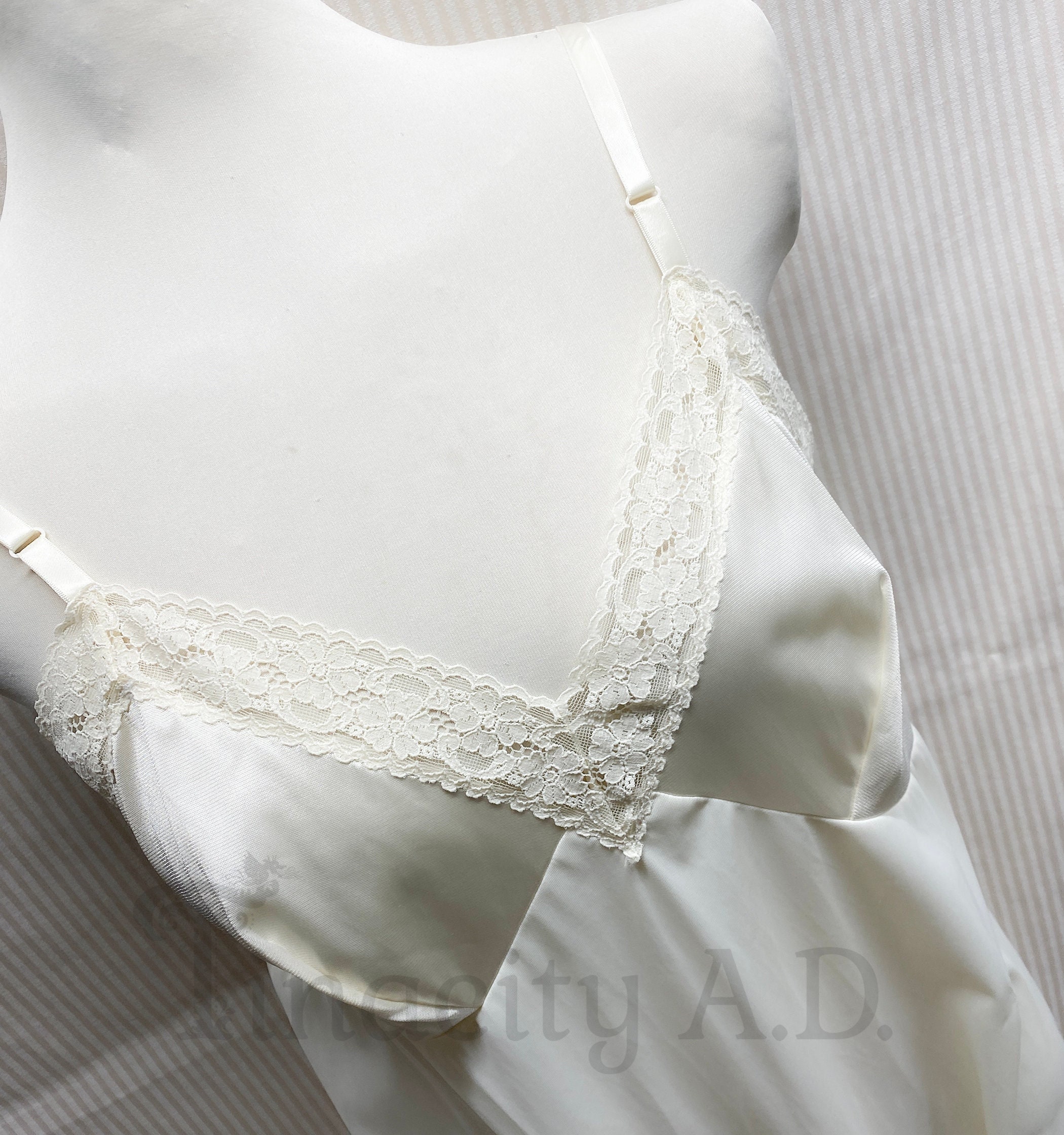 A Vintage 1970's Era Vanity Fair Three-Quarter Dress Slip, Light Cream Colored with Lace Trim, Size 38 (US size 10)