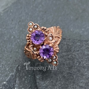 A Vintage Victorian Revival Ring Featuring Amethysts with Seed Pearl Accents Set in a Lovely Rose Gold Mounting, Circa 1950's