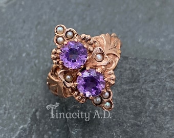 A Vintage Victorian Revival Ring Featuring Amethysts with Seed Pearl Accents Set in a Lovely Rose Gold Mounting, Circa 1950's