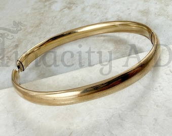 Vintage Gold-Filled Bangle Bracelet, Slightly Domed Profile with Safety Bar, 6 1/2-Inches Circumference, Circa 1960's.