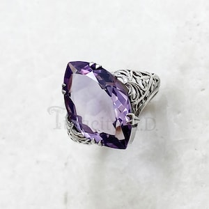 Lovely Vintage Art Deco-Era Sterling Silver Filigree Ring Featuring a Large Marquise Cut Amethyst, Size 6, Circa 1940.