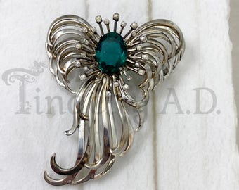A Gorgeous Ralph DeRosa Large Sterling Silver Spray Design brooch with Green Oval Center and Rhinestone Accents, Circa 1950's