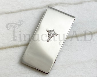 A Vintage Silver -Tone Classic Style Money Clip with a Caduceus "Staff of Hermes" on the Front