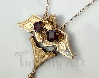 An Antique Victorian Articulated Brooch, Gold-Filled with Imitation Garnets, That Can Also Be Worn as a Pendant, Circa 1880's.