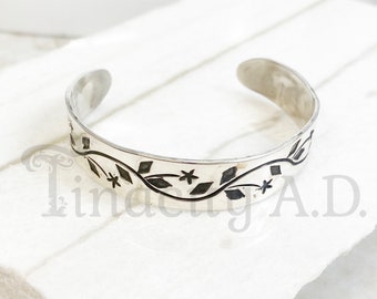 A Vintage Bernice Goodspeed Sterling Silver Cuff Bangle Bracelet with Oxidized Vine and Star Design Throughout, Circa 1960's