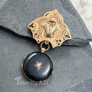 A Lovely Victorian Fancy Engraved Taille D&#39;Epargne Design Chatelaine Brooch and Black Enameled Locket with Seed Pearl Accents, Circa 1880&#39;s
