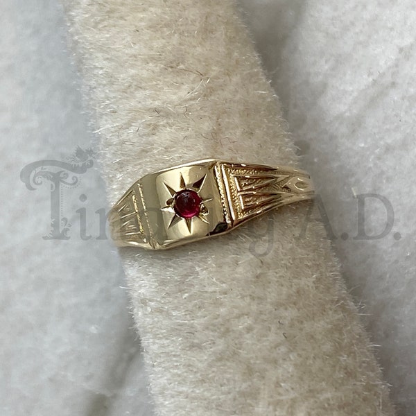 A Tiny Vintage Edwardian Youth or Pinky Finger Ring, 10k Yellow Gold with Imitation Ruby and Stamped Desgin, Circa 1900