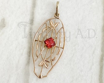 A Vintage 10k Yellow Gold Filigree Pendant with a Square Faceted Red Imitation Garnet and Delicate Chain, Circa 1910