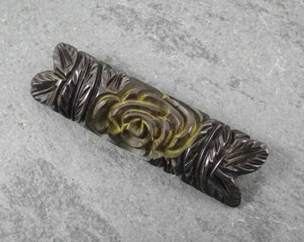 Vintage Black Carved Bakelite Bar Brooch with Elaborate Flower Design, Circa 1930