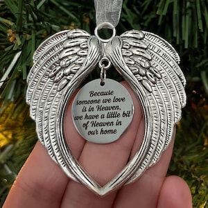 Because Someone We Love Is In Heaven There&#39;s A Little Bit Of Heaven In Our Home Memorial Angel Wings Christmas Ornament Gift