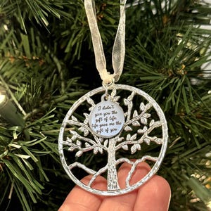 May include: Silver tree of life ornament with a round tag that reads "I didn't give you the gift of life. Life gave me the gift of you."