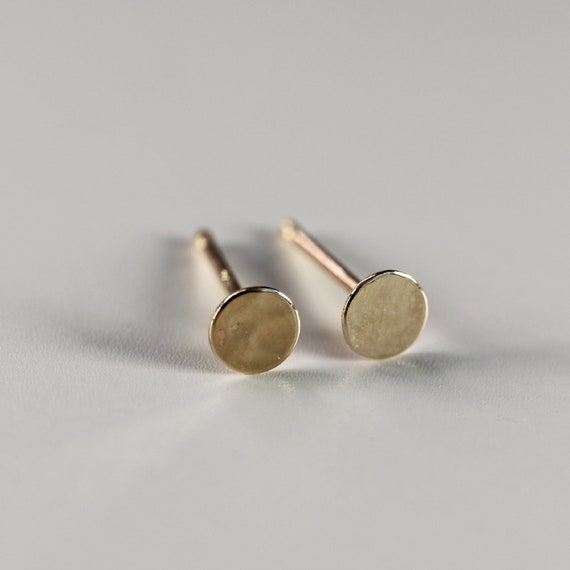 Tiny solid gold stud earrings discount
