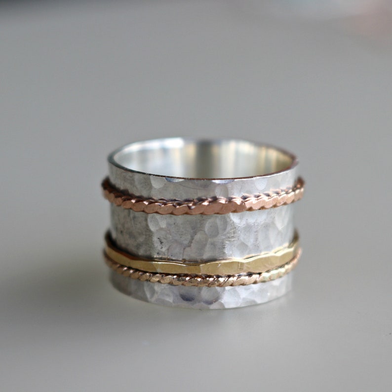 "sterling silver spinner ring"