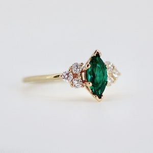 14k Gold Marquise Emerald Ring with Diamond Accents