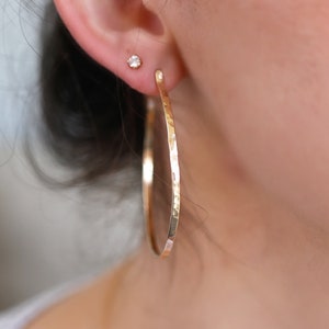 Earrings on the ear.