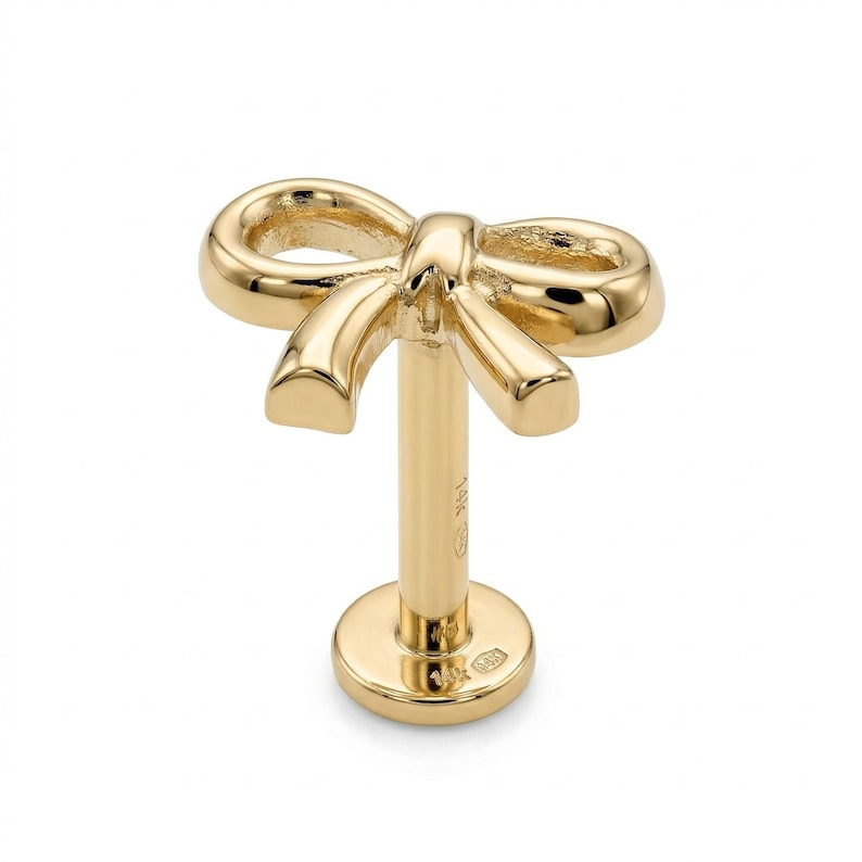 small ribbon bow earrings in 14k gold flat back internally threaded stud close up detail