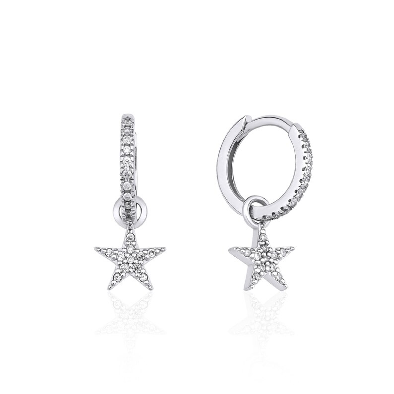 May include: A pair of silver hoop earrings with a star charm dangling from each hoop. The hoops and stars are encrusted with small, clear cubic zirconia stones.