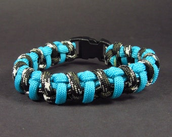 Sky Blue and White Speckled Black Paracord Bracelet