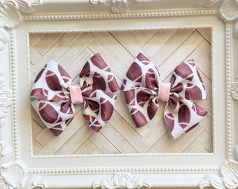 Set football print bows pigtail clips