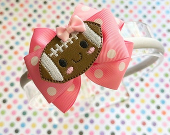 Pink polka dot football  headband 4” bow