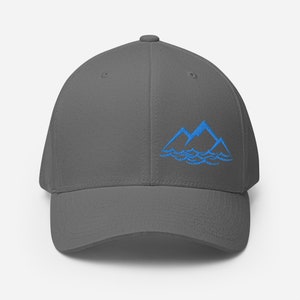 May include: A gray baseball cap with a blue embroidered design of mountains and waves.