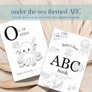 May include: Two white cards with black line drawings of sea creatures and the text "under the sea themed ABC". One card says "O is for octopus". The other says "Baby's first ABC book".