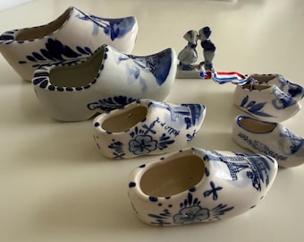 Lot of 7 Holland Ceramic Shoes & kissing couple