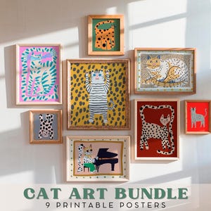 May include: A set of nine printable cat art posters featuring colorful illustrations of cats in various poses. The posters are framed in wood and displayed on a white wall. The text "CAT ART BUNDLE 9 PRINTABLE POSTERS" is displayed at the bottom of the image.