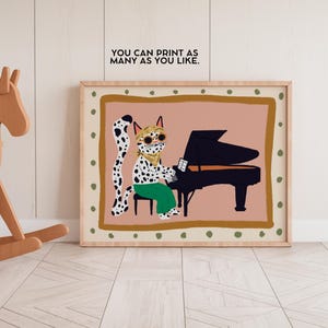 May include: A digital illustration of a spotted cat wearing sunglasses playing a black piano. The cat is wearing a green shirt and has a long tail. The background is a light pink color with a brown frame.