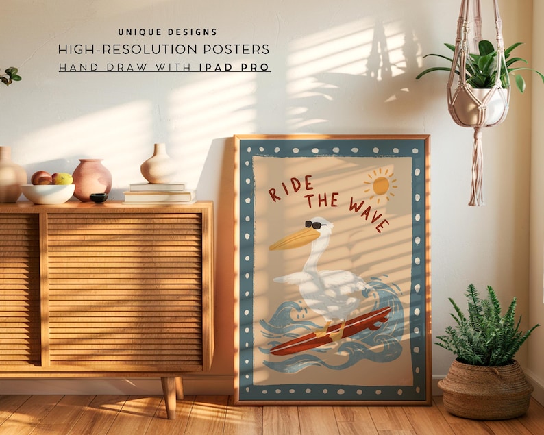 May include: A framed poster with a vintage-style illustration of a pelican surfing. The pelican wears sunglasses and rides a red surfboard on a blue wave. The poster has a blue border with white dots and the words "Ride the Wave".
