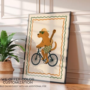 May include: A framed art print featuring a brown dog wearing sunglasses and a hat, riding a bicycle with a guitar on its back. The artwork has a cream background with a decorative border. The text at the bottom says "WE OFFER COLOR CUSTOMIZATION".