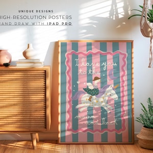 May include: A framed poster with a whimsical illustration of a person riding a unicorn. The artwork features a pink and blue striped background with the text "I love you to the moon and back." The poster is displayed in a room with a wooden cabinet and plants.