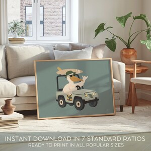 May include: A framed art print featuring a cartoon duck driving a light green jeep with a surfboard on top. The duck wears a green hat and sunglasses. The background is a muted teal color. Text at the bottom reads "INSTANT DOWNLOAD IN 7 STANDARD RATIOS READY TO PRINT IN ALL POPULAR SIZES."
