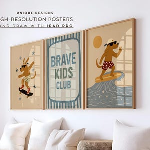 May include: Three framed posters featuring illustrations of a brown dog. The left poster shows the dog on a skateboard. The center poster displays the text BRAVE KIDS CLUB. The right poster depicts the dog surfing on a wave under a sun.