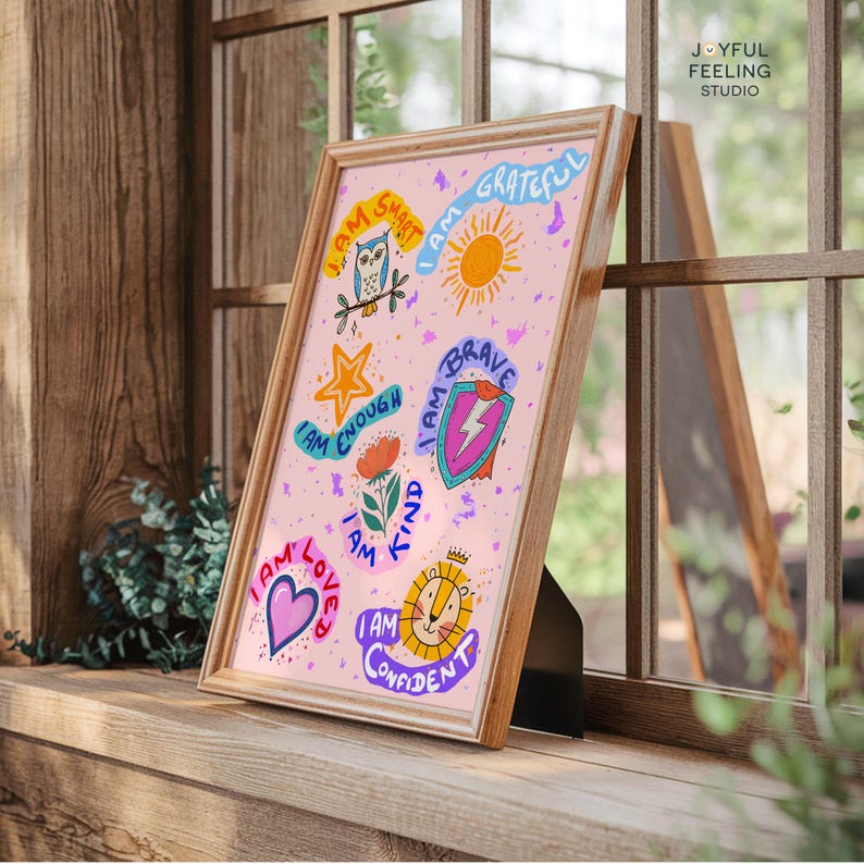 May include: A pink framed motivational poster with colorful illustrations and text that says "I am smart", "I am grateful", "I am enough", "I am kind", "I am brave", "I am loved", "I am confident".