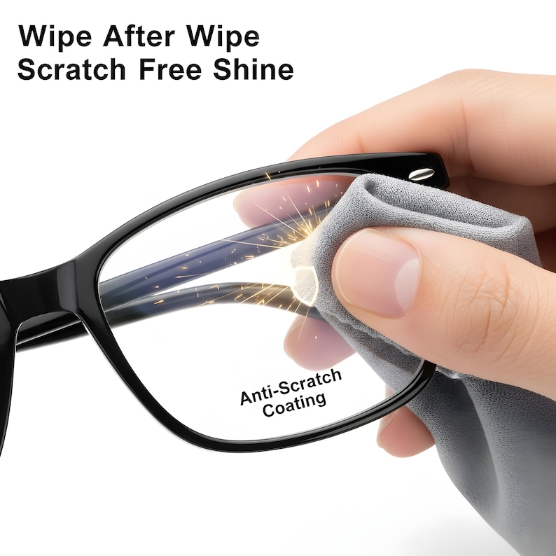 May include: Black eyeglasses being cleaned with a gray microfiber cloth. The glasses have a rectangular frame and clear lenses. Text on the image reads "Wipe After Wipe Scratch Free Shine" and "Anti-Scratch Coating".