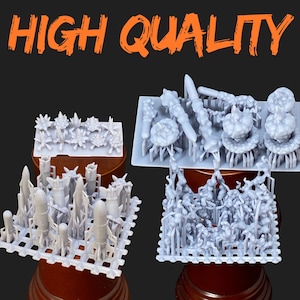 May include: Four grey plastic model kits featuring rockets, plants, and abstract shapes. The image includes the orange text "HIGH QUALITY". The models are displayed against a dark background.