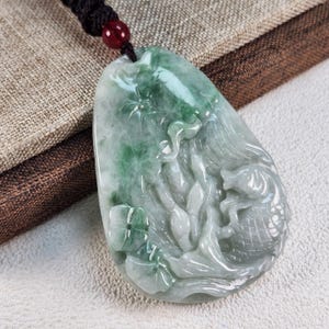 Well carved fish lotus carry out idiom 連年有餘 untreated natural type A jadeite jade pendant with pretty necklace cord