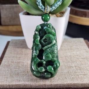 Grade A 3D fishes lotus carry out idiom of 連年有餘 well carved untreated natural type A jadeite jade pendant with pretty necklace cord