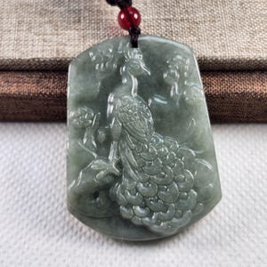 Beautiful Phoenix 鳳凰 well carved untreated translucent natural type A jadeite jade pendant with necklace cord