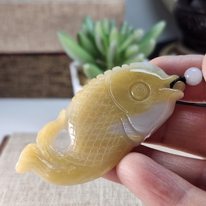 Lovely grade A two-sided 3D fish well carved untreated natural type A jadeite jade pendant with necklace cord