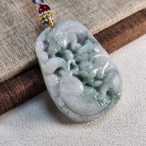 Lovely 3D fish and lotus carry out idiom 連年有餘 untreated natural type A jadeite jade pendant with pretty necklace cord