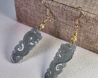 Pretty dragon hollow carved and well crafted untreated translucent natural jadeite jade silver S925 earrings