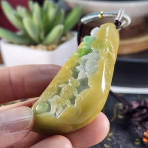 Well carved gold fish and flowers untreated natural type A jadeite jade pendant with pretty necklace cord